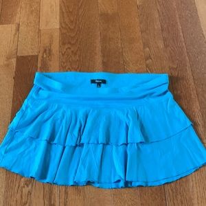 Express fun and flirty blue ruffled skirt size L